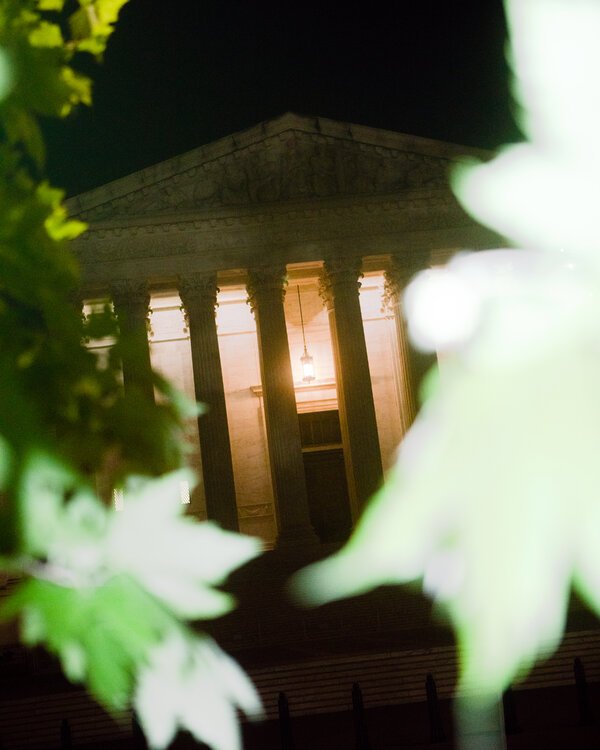 An image of the U.S. Supreme Court in the evening.